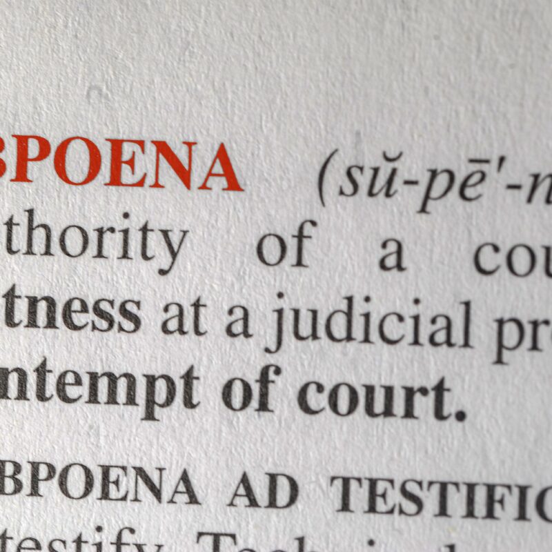 close up photo of the words subpoena